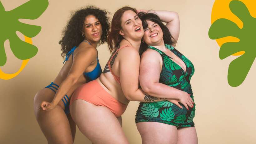 Plus size women in swimming suits smiling. Living in a Larger Body.